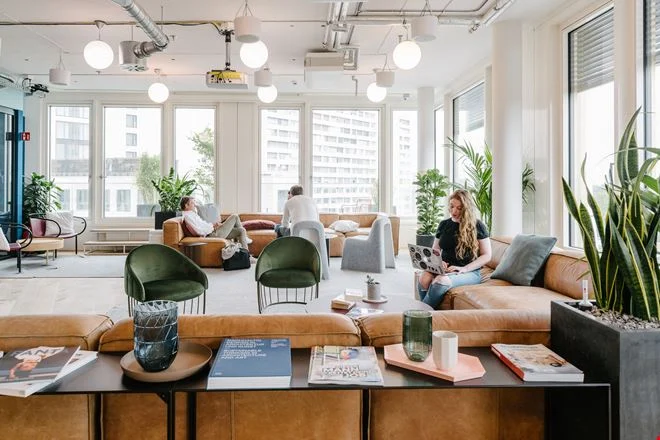 Best Cities for Remote Work: WeWork Kurfürstendamm, Berlin puts its members in six full floors of a modern masterpiece, offering a shared workspace experience fresh from the future.