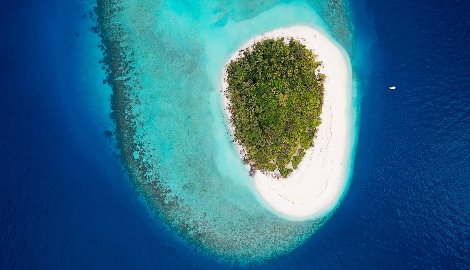 Aerial view of one of the many picturesque islands in the Maldives - Photo by Hoodh Ahmed